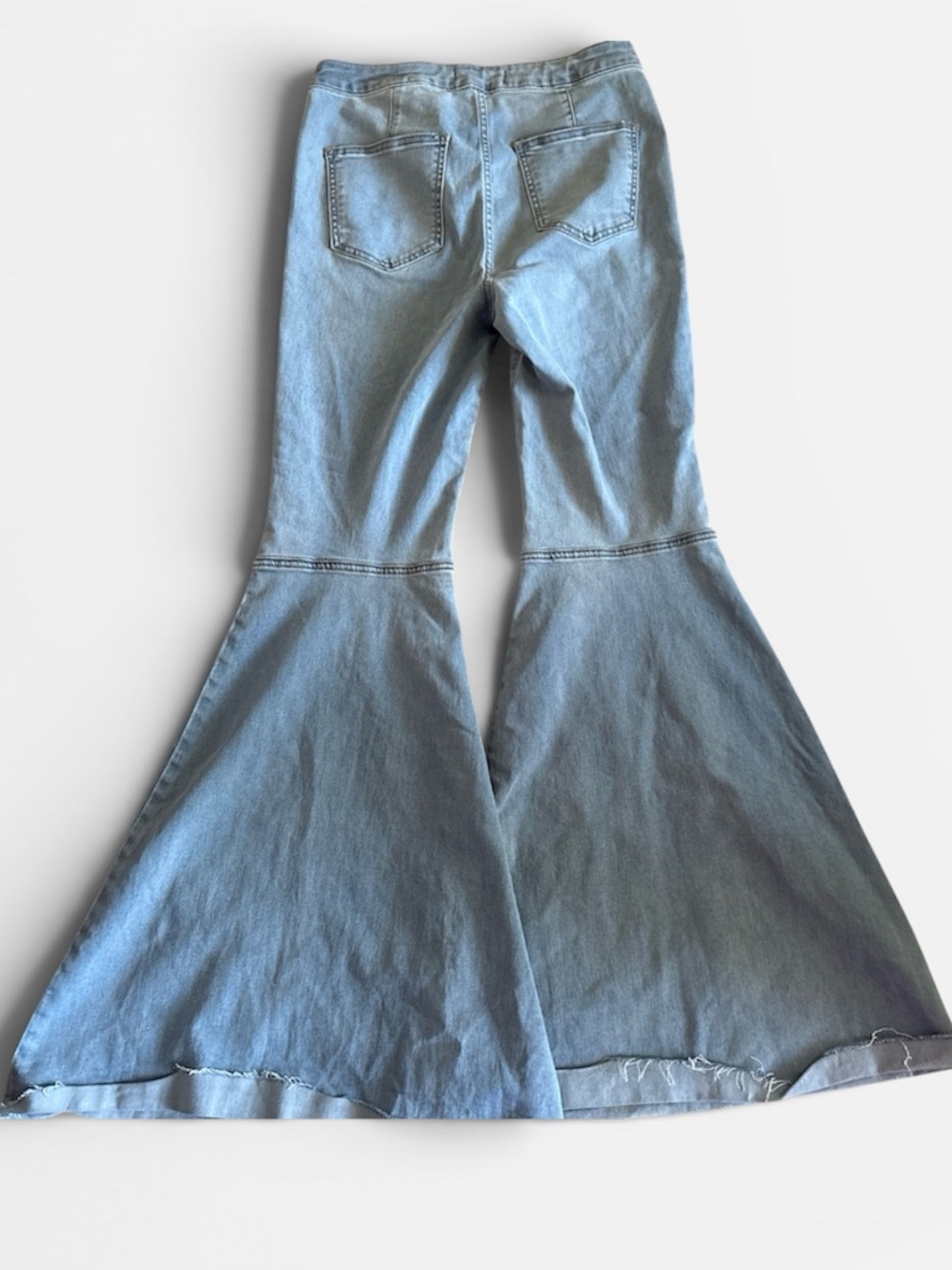 We The Free Light Blue Wide-Leg Flare Jeans float on wide leg 29